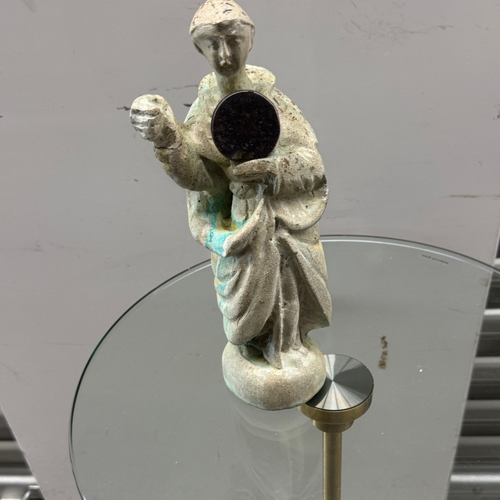 Elegant Stone Sculpture with Brass Accents